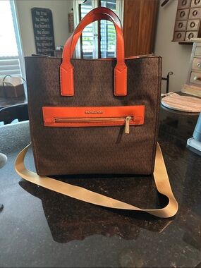 Michael Kors Brown Canvas Messenger Bag with Orange Trim and Beige Strap